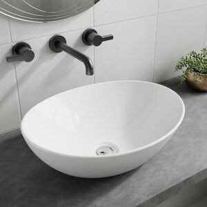 Elegant white ceramic oval countertop basin for cloakrooms