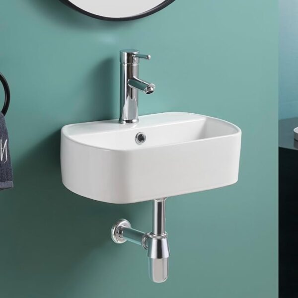 Modern white ceramic wall hung basin with pop-up waste and bottle trap